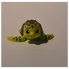 Terrarium met moeder zeeschildpad en kind